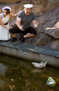 #28 Stage a mini-newspaper boat regatta in a public fountain with at least four competing vessels. We must see intense competitiveness and gambling.GISHWHES Hall of Fame!