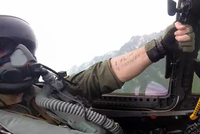 #71 (Video)  Let's see what a fighter jet passenger or pilot POV looks like. The video must be shot during a flight and the aircraft must do a complete ''roll'' during the video. After completing the roll, you or the pilot must hold up a hand or arm on which is written, ''GISHWHES does Mach 2'', ''I flip for GISHWHES,'' or a similar phrase.