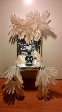 #81 Erect a tribute to Horris Packard, the inventor of Rubber Gloves.