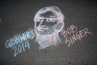 #83 The writers and producers of the TV series, “Supernatural”, sometimes pretend they don’t like the limelight. Of course this is false-modesty. Immortalize one of them with a stately portrait done in sidewalk chalk art.