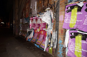 Soon the streets will be no more--pressed in by the push of paper.