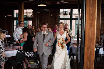 Bill walks Cassi down the 'aisle'.