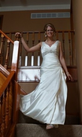 Cassi walking down to her groom.