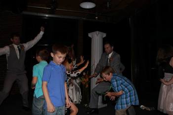 Ryan and Stefan show the younger kids some moves.