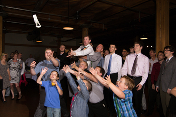 Ryan makes a spectacular dive for the garter.